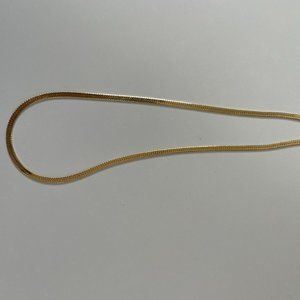 Gold colored necklace